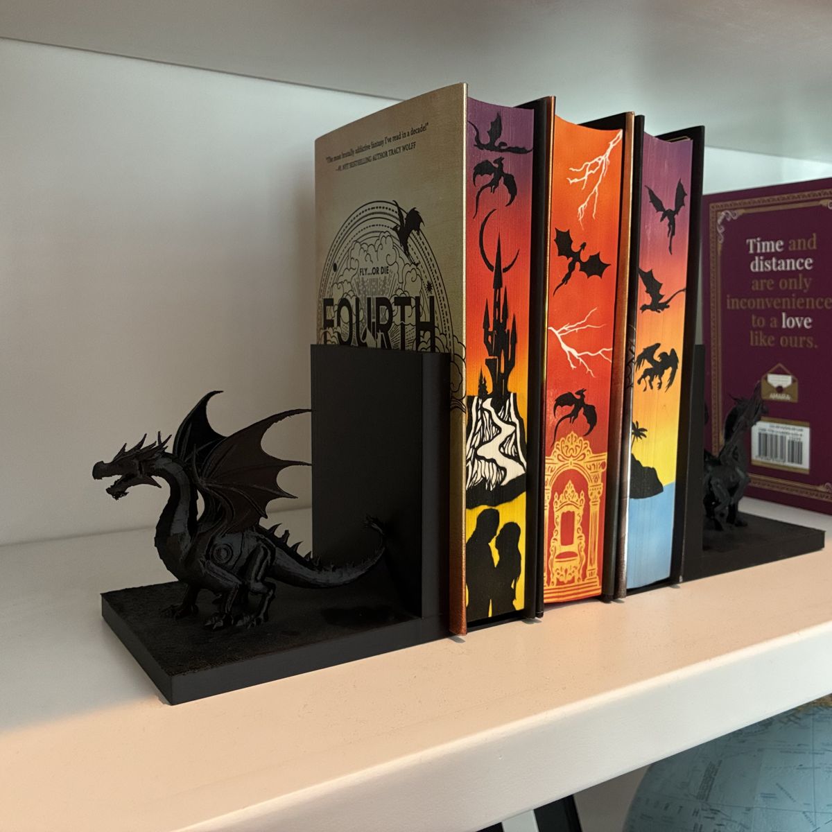 Pair of black 3D-printed dragon bookends